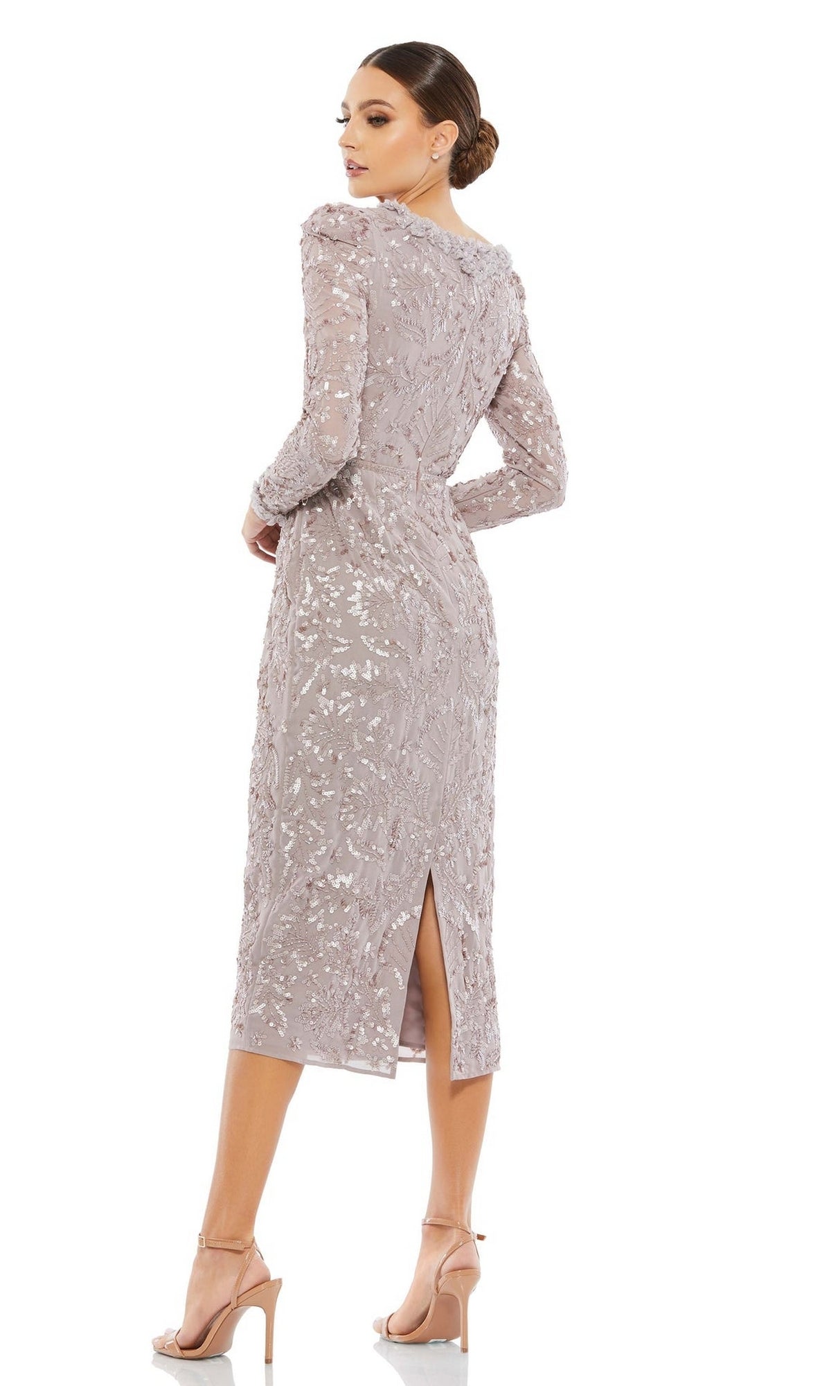 A woman wears the Sequin Midi Wedding Guest Dress: Mac Duggal 93595, featuring long sleeves, sequins, a back slit, and nude heels against a white background—an elegant option for wedding guests.